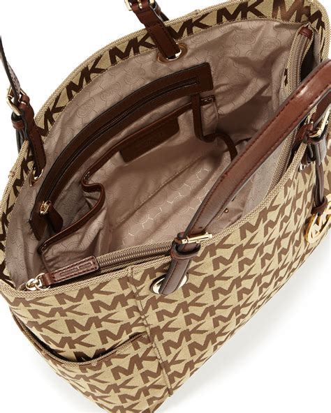 michael kors jet set ew signature tote brown|Michael Kors airplane bag.